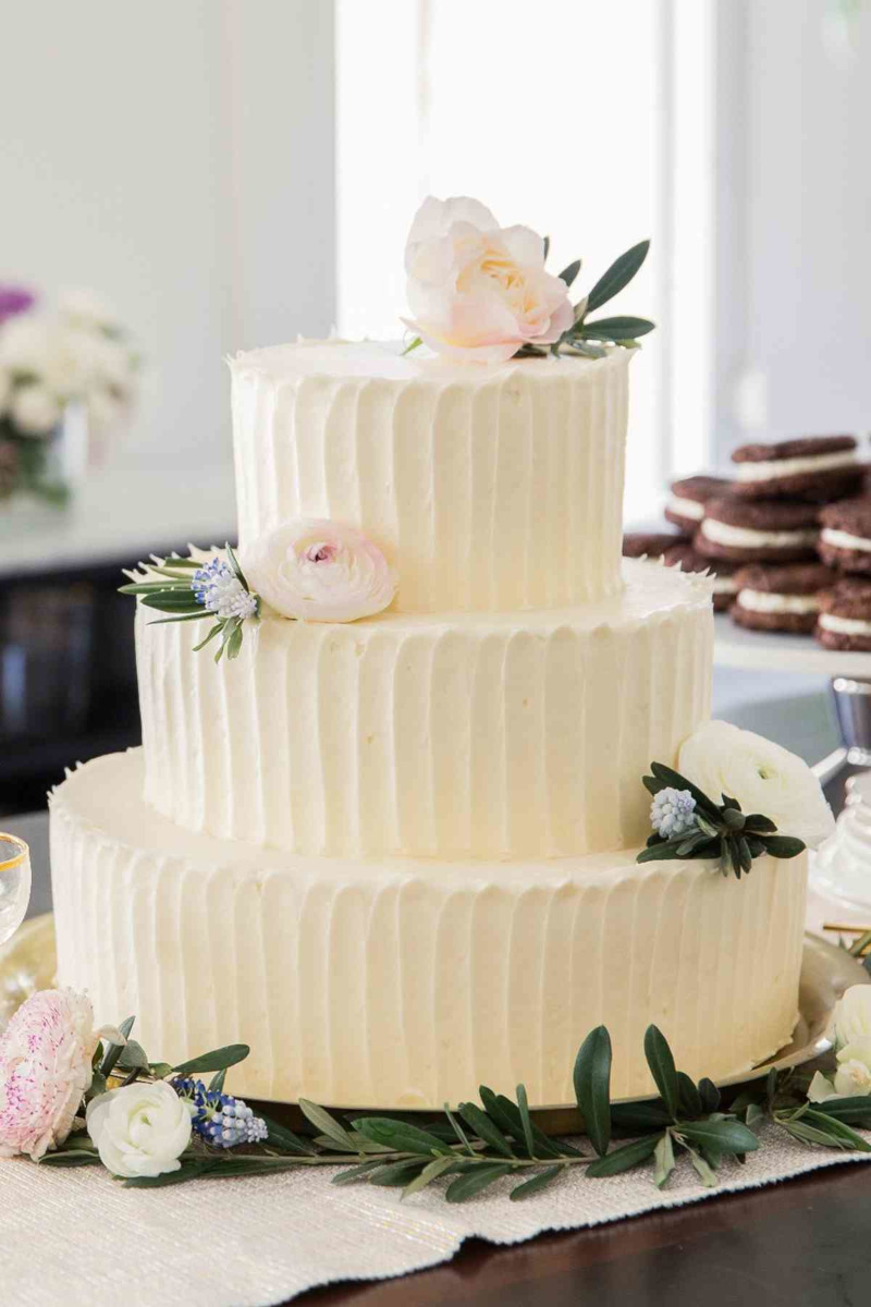 3 tier whipped cream or butter cream finish texturized with vertical contours